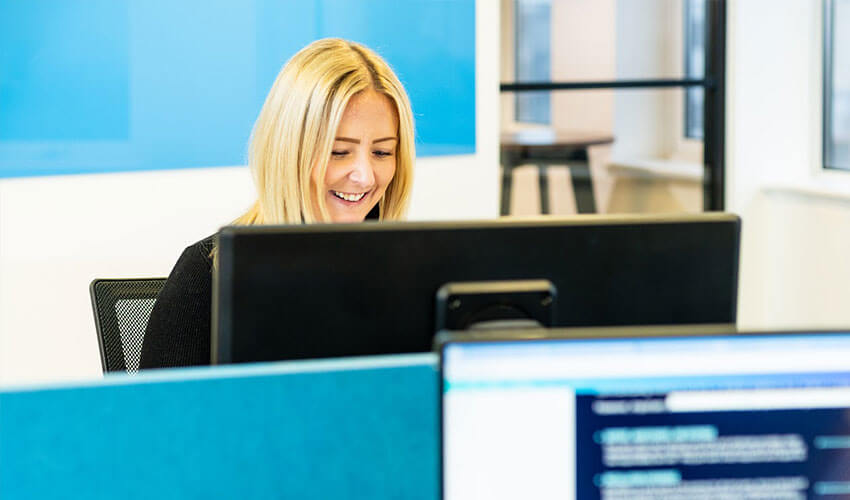 Hayley working on a computer.