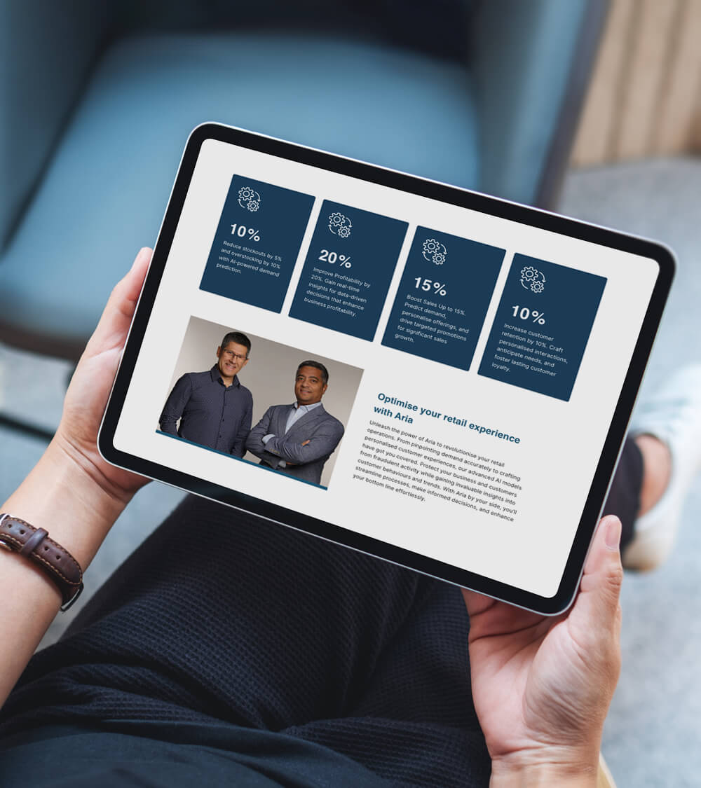 a person using the new Aria Intelligent Solutions website on their tablet