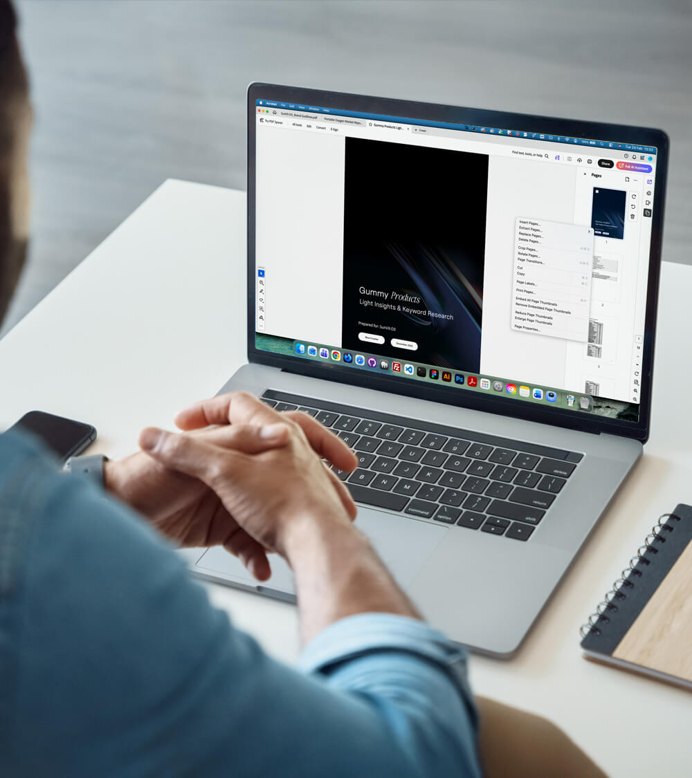 a man viewing a custom market research presentation on a laptop