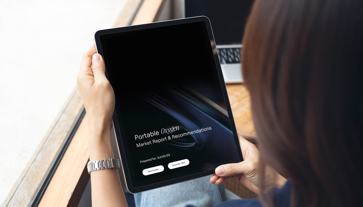 a lady holding a tablet device reviewing a custom market research presentation