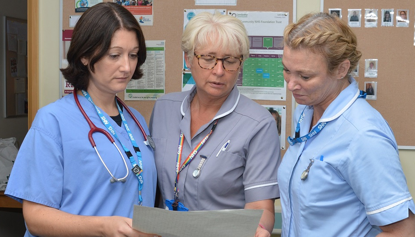 3 NHS nurses working