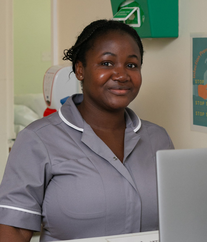 NHS Nurse working on computer