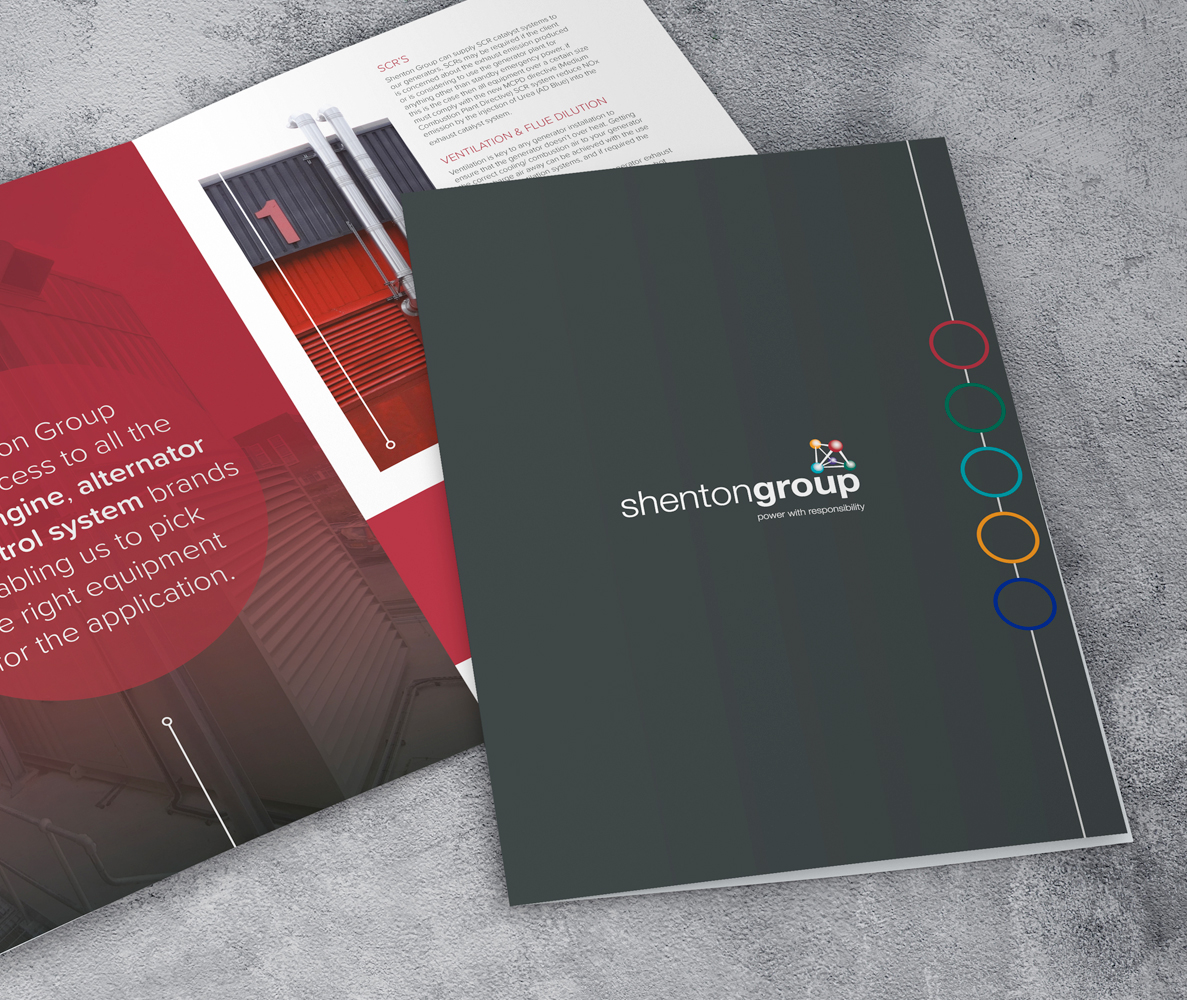 A photo of two, smartly presented matte-colour brochures for a power solution consultancy