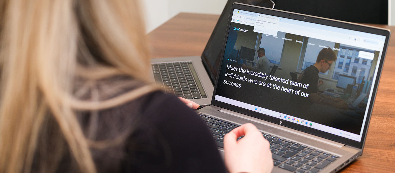 The Blue Frontier website on a laptop. 