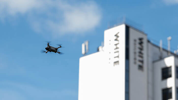 A drone flying near Southampton White Building.