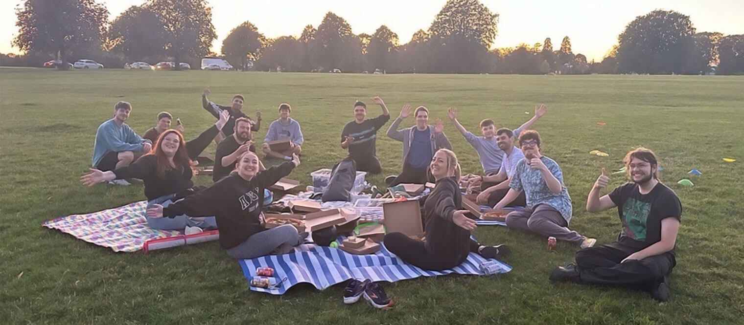 Digital Team having a sunset picnic