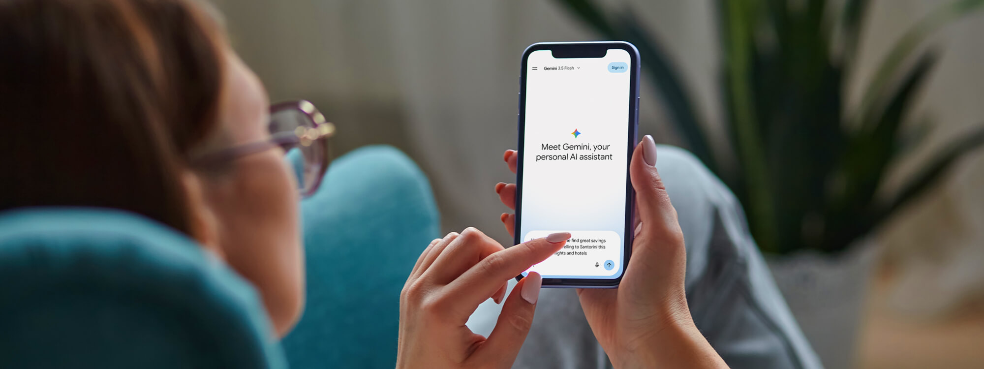 a woman using her mobile phone to chat with Gemini; Google's AI agent