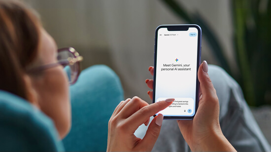 a woman using her mobile phone to chat with Gemini; Google's AI agent