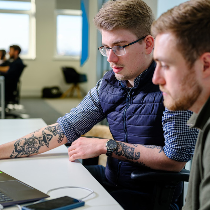 Charlie and Ben working on custom ecommerce solution