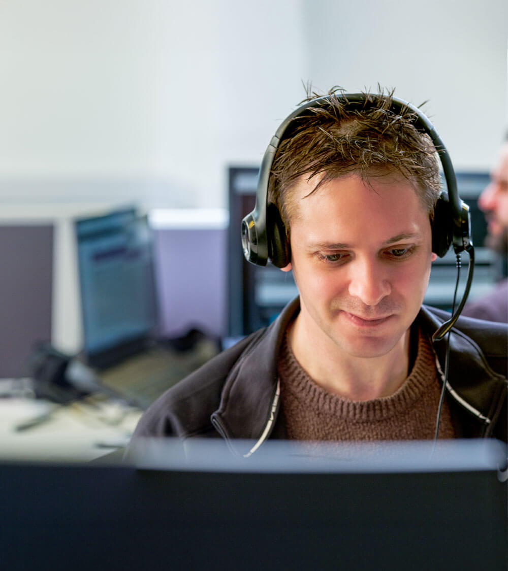 Birju and Kian in the background in the Bristol office