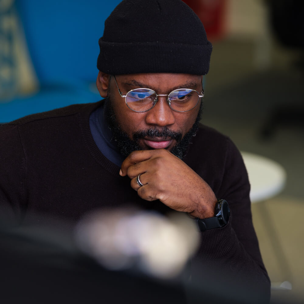 a developer concentrating on a computer screen