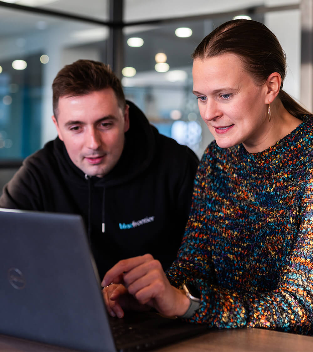Oli and Gretchen working on development project