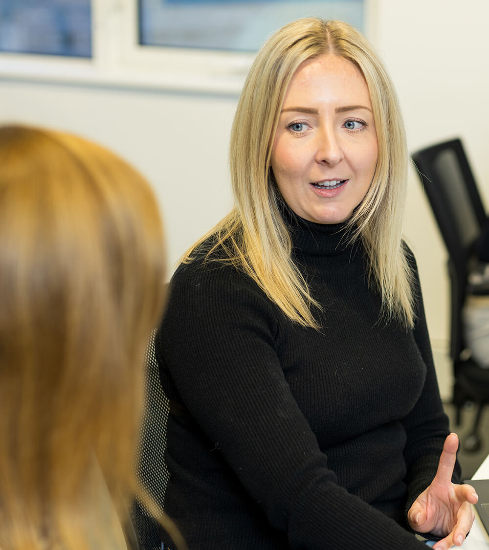 Hayley chatting in the Southampton office