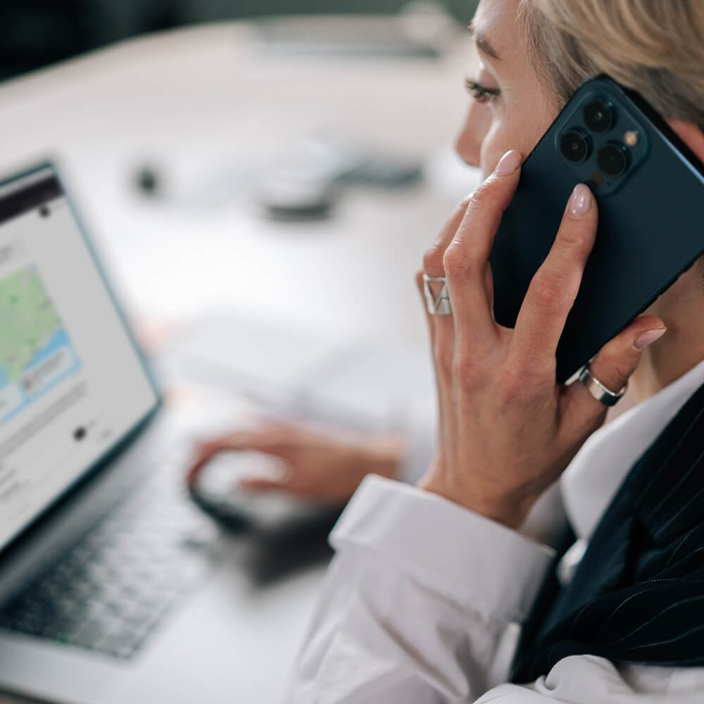 a customer on the phone whilst using ChatGPT to search for local businesses