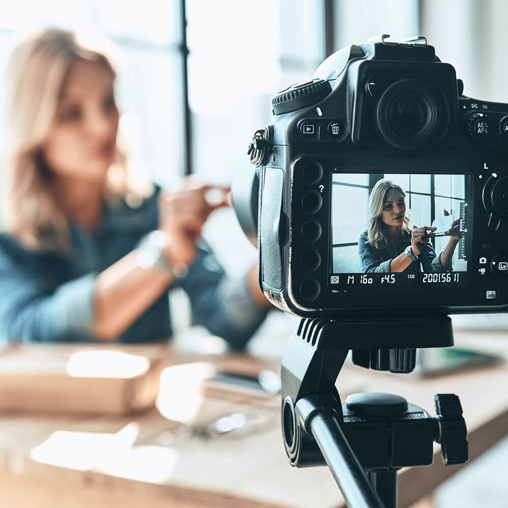 Planning creative campaigns - camera recording woman Planning creative campaigns - camera recording woman