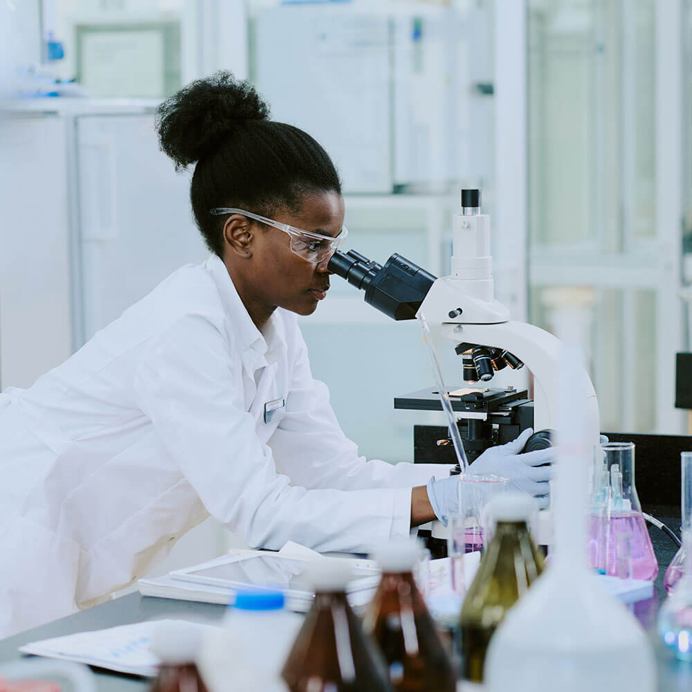 Person working in a medical lab Person working in a medical lab