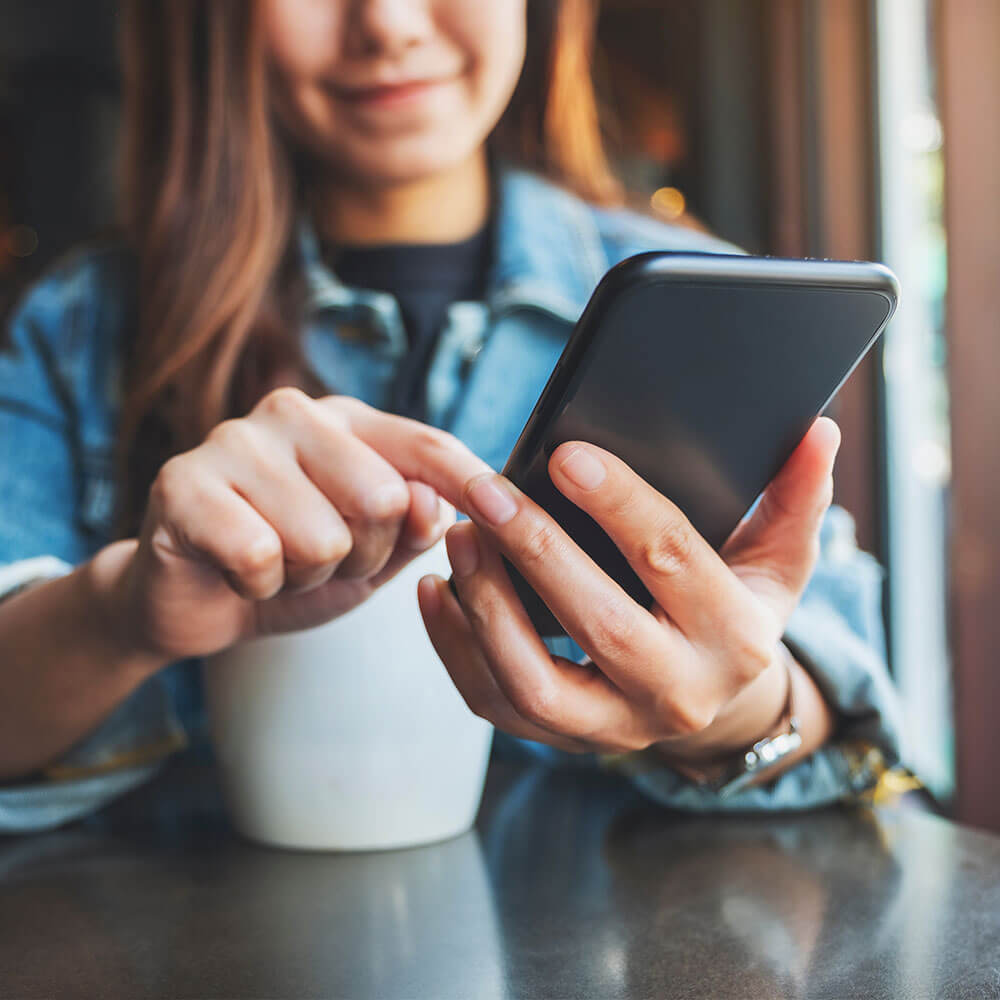Go to market strategy image - coffee and on mobile device