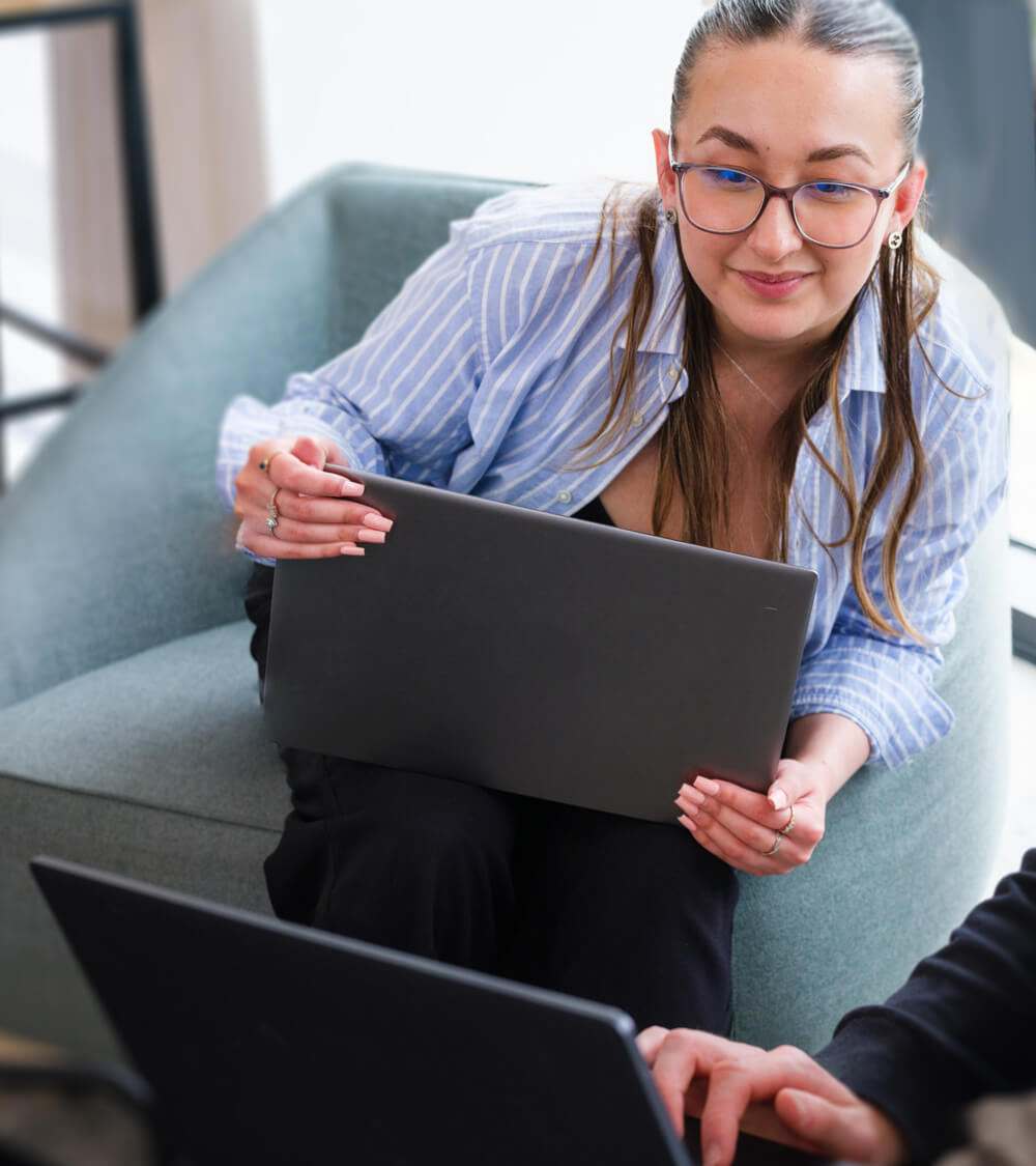 a colleague demonstrates how to report a phishing email to a customer